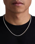 Model wearing 3mm 18K gold ice sparkler tennis chain set by Iceman Society, front view