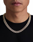 Model wearing 12mm 18K gold iceman cuban chain set by Iceman Society, front view