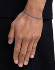 Model wearing 3mm white gold plain cuban bracelet by Iceman Society