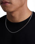 Model wearing 3mm white gold plain cuban necklace by Iceman Society, side view