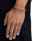 Model wearing 12mm 18K gold plain cuban chain set by Iceman Society, side view