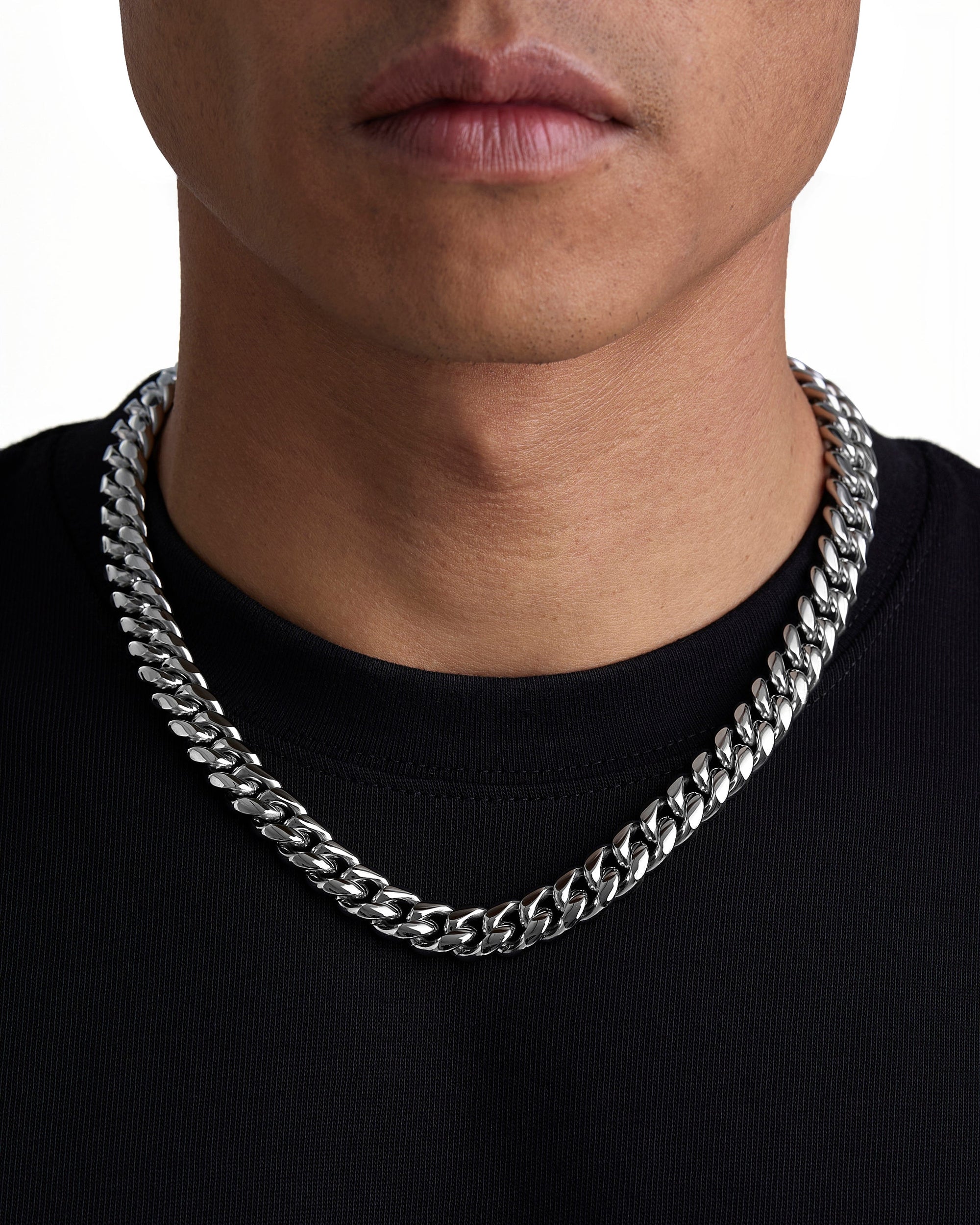 Model wearing 12mm white gold plain cuban chain set by Iceman Society, front view