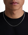 Model wearing 3mm white gold plain cuban chain set by Iceman Society, front view