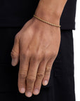 Model wearing 3mm 18k gold rope bracelet by Iceman Society