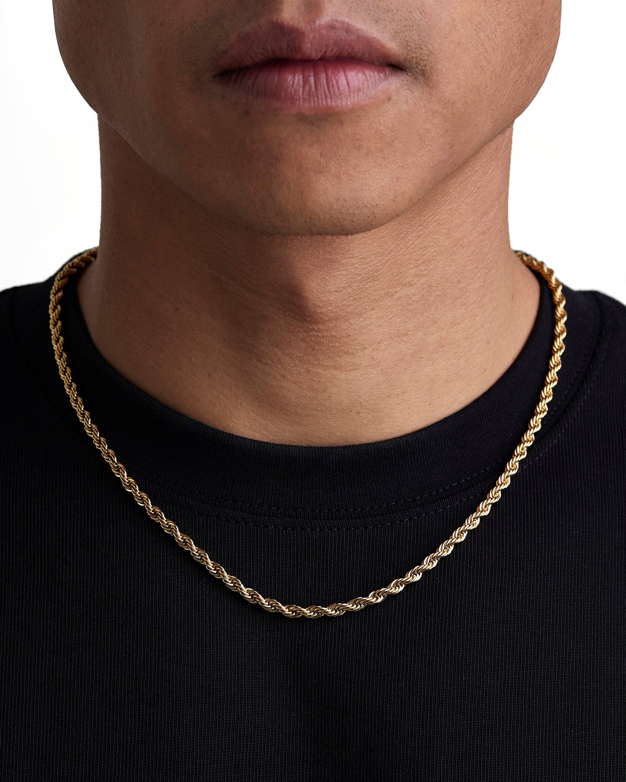 Model wearing 4mm 18k gold rope chain set by Iceman Society, front view