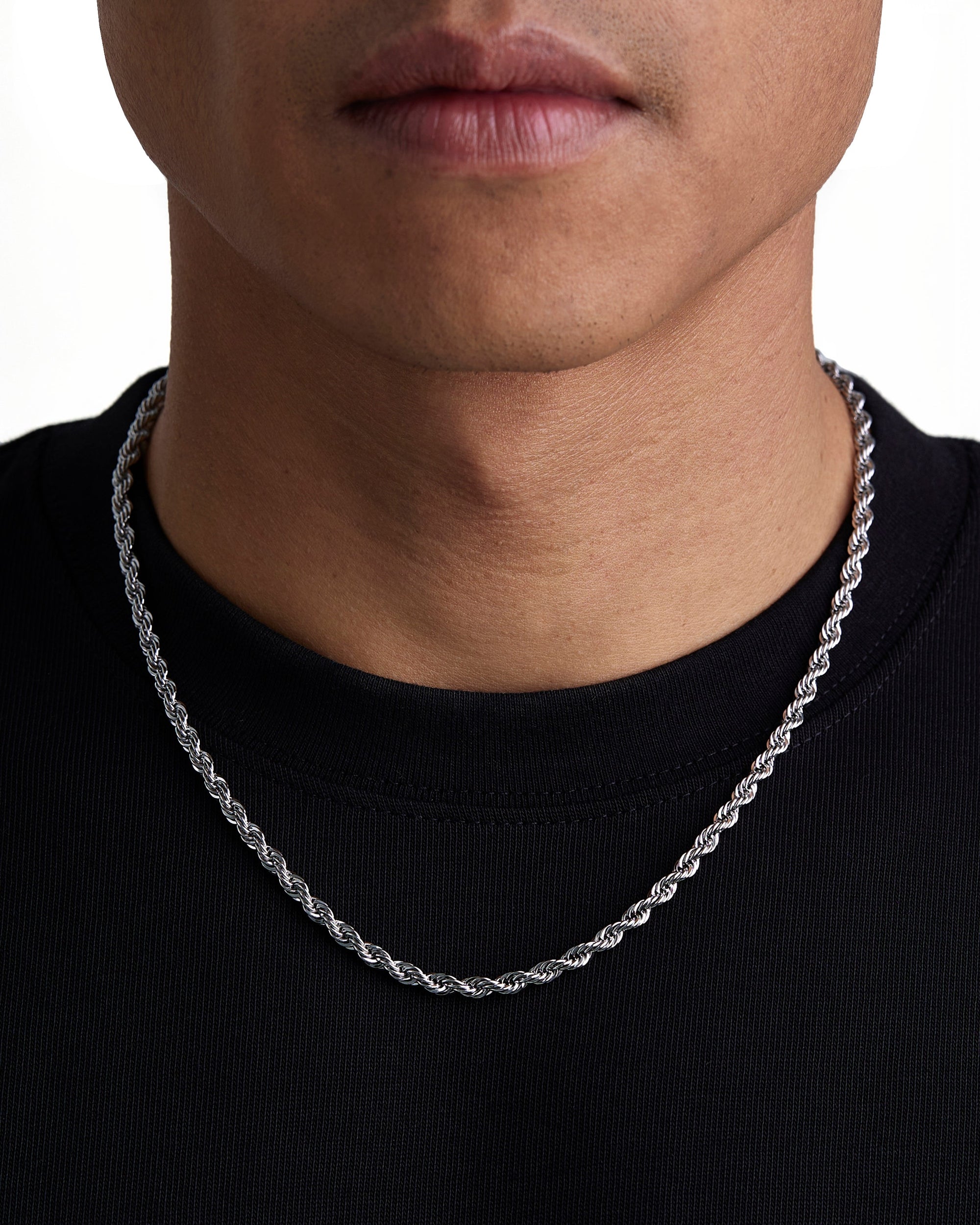 Model wearing 4mm white gold rope chain set by Iceman Society, front view