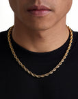 Model wearing 6mm 18k gold rope chain set by Iceman Society, front view